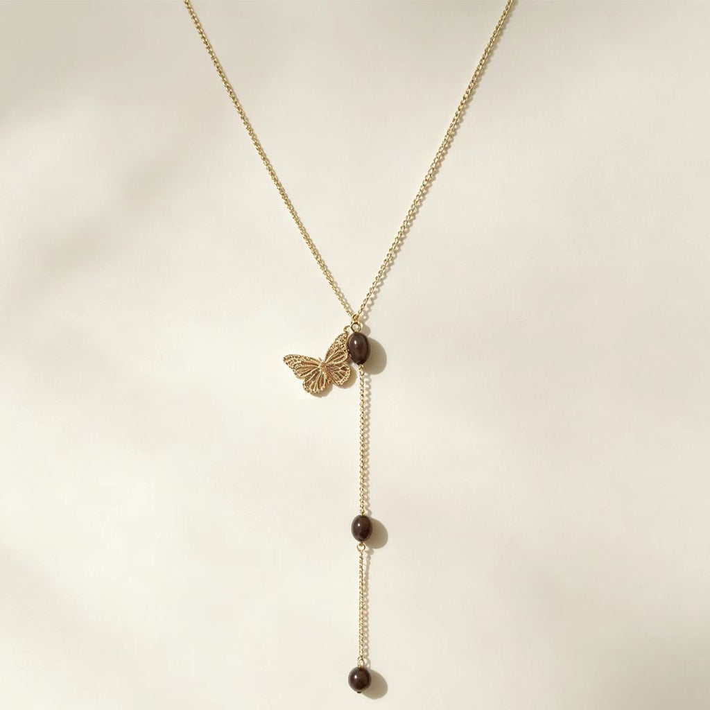 Vintage-Halskette mit Schmetterling und Perle