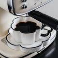 Vintage Tasse mit Untertasse, schwarz-weiss floral