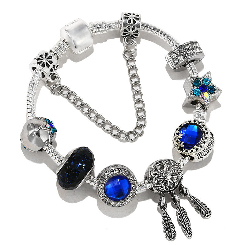 Armband mit Stern- und Mondanhänger – Bild 14 | LuxeStyle