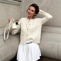 Bestickter Grobstrick-Pullover