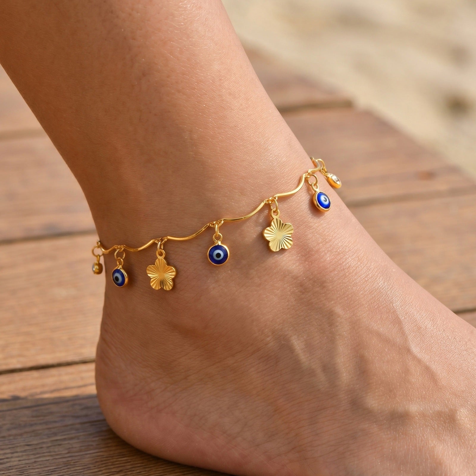 Sommer-Armband «Évil» · Schmetterling & Nazar-Auge, vergoldet