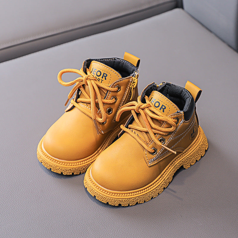 Gelbe Kinderstiefel