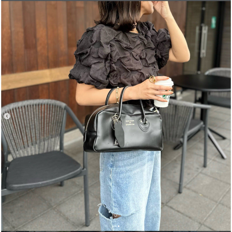 Elegante Bluse mit Puffärmeln und Raffung