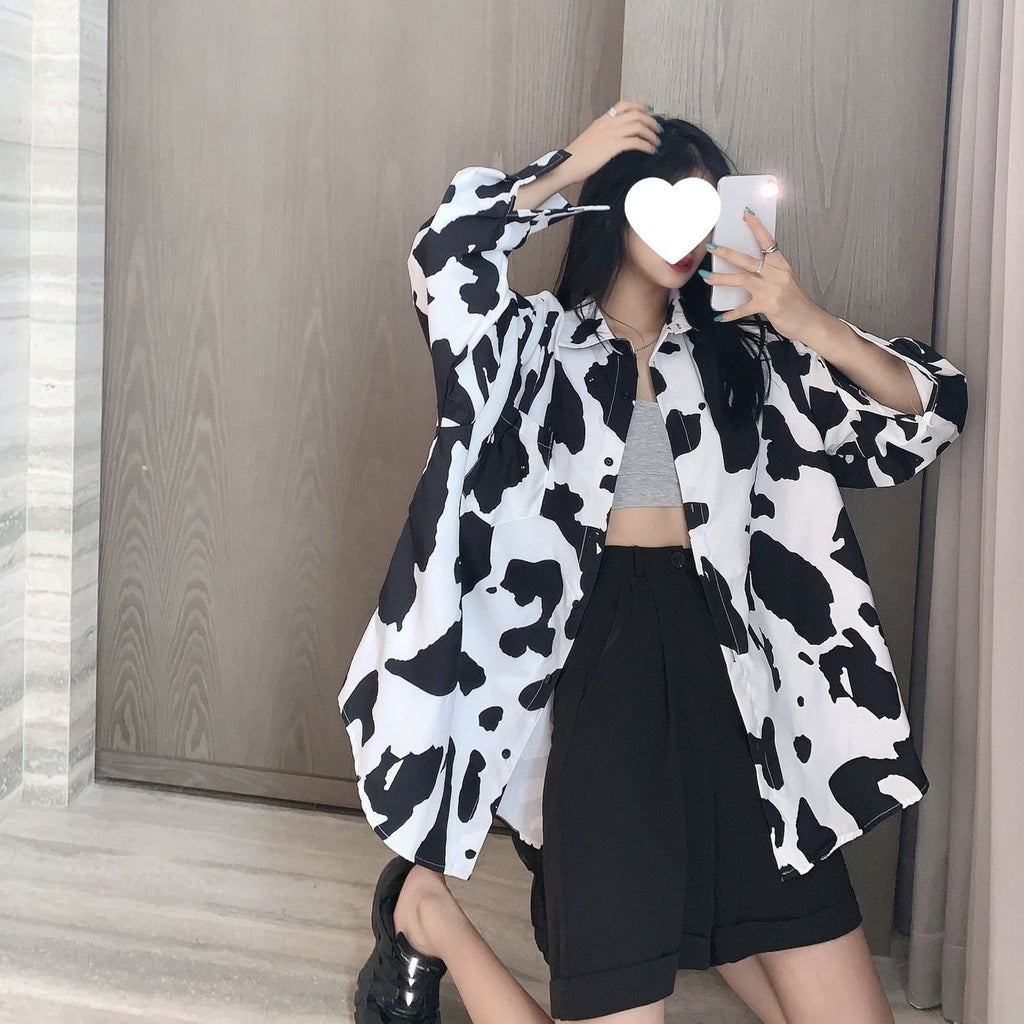 Schwarz-weiss gemusterte Bluse mit Leopardenprint