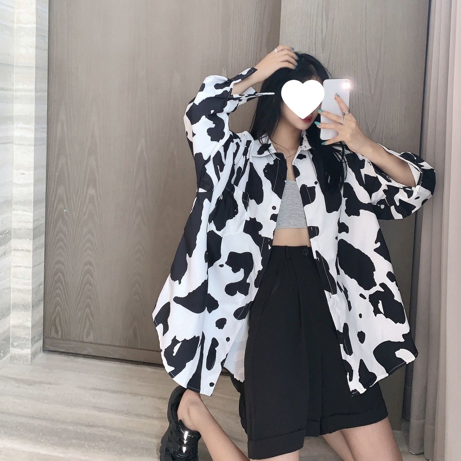 Schwarz-weiss gemusterte Bluse mit Leopardenprint