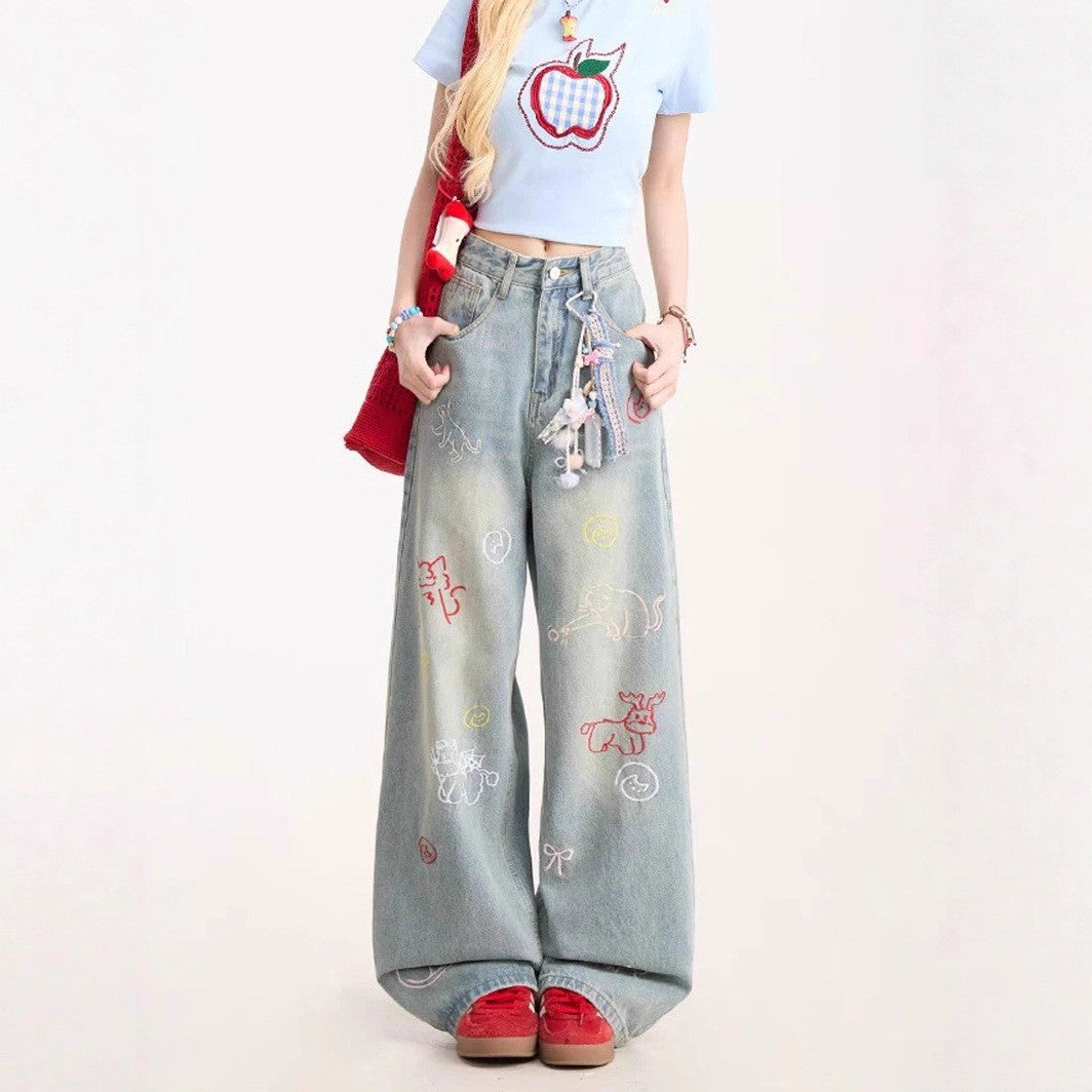 Blaue Jeans mit Cartoon-Stickerei