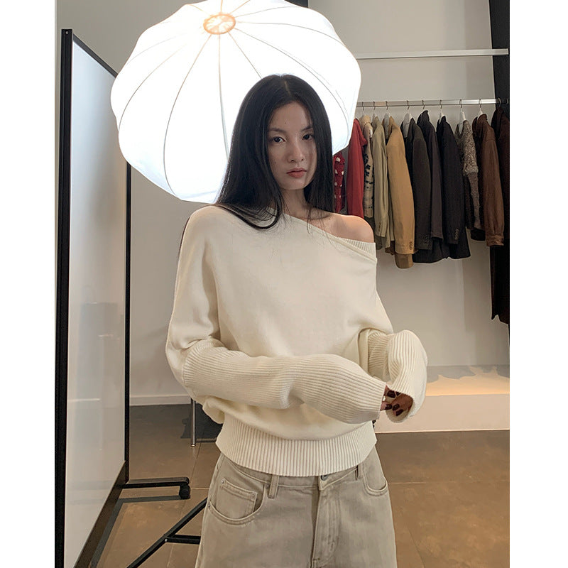 Off-Shoulder Rollkragenpullover aus Wolle