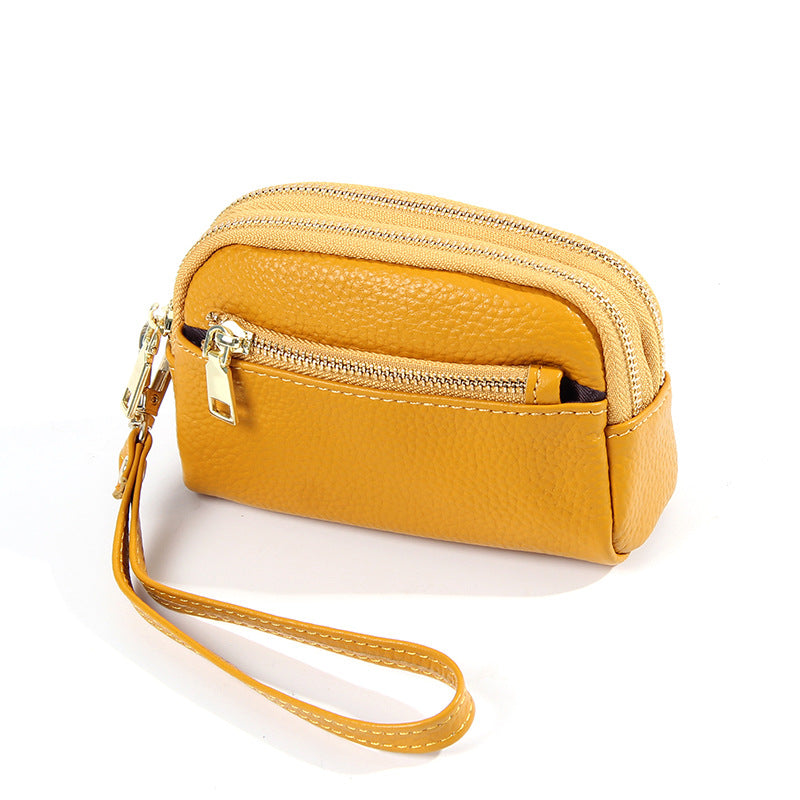 Minimalistische Leder-Münztasche mit drei Reissverschlüssen – Bild 6 | LuxeStyle