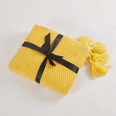 Nordische Strickdecke mit Quasten