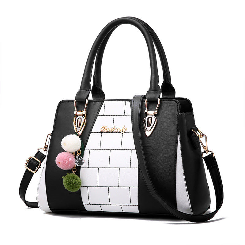 Schultertasche im Killer Bag-Stil
