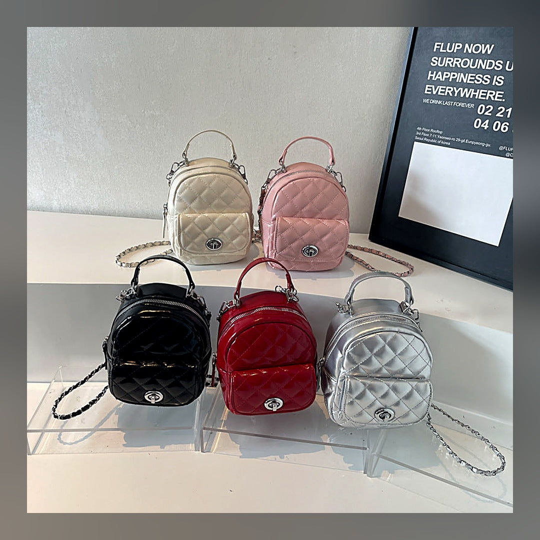 LuxeStyle-Edit · Reise-Rucksack mit Kettengriff – kompakt, vegan-Leder, mehrere Fächer